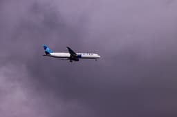 United Airlines aircraft with modern livery at airport terminal