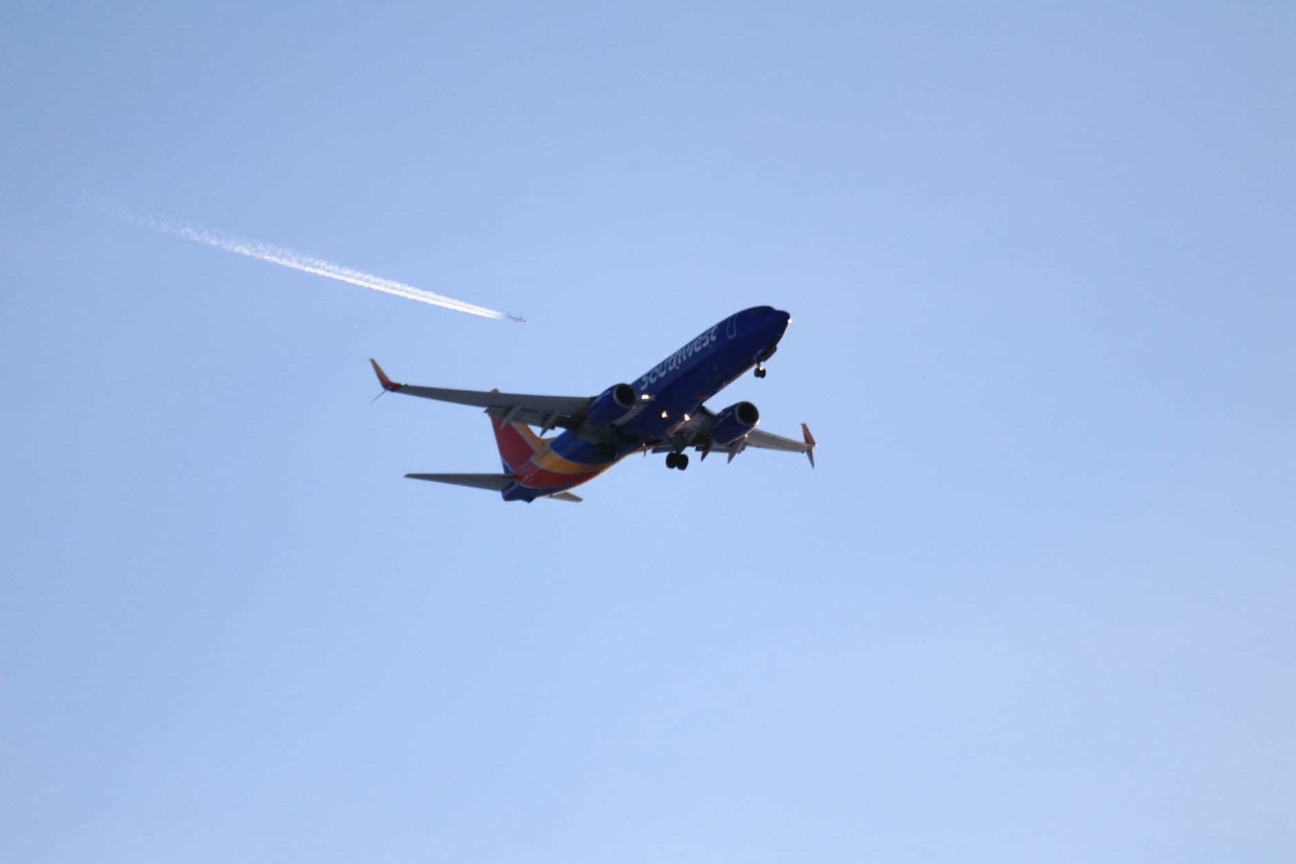 Southwest Airlines aircraft with distinctive livery at airport gate