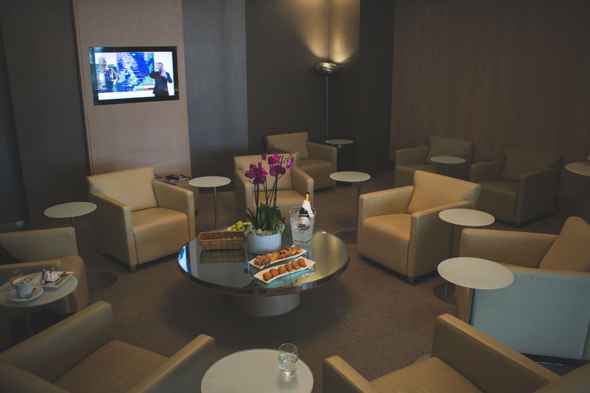 Airport business lounge with luxury seating and modern amenities