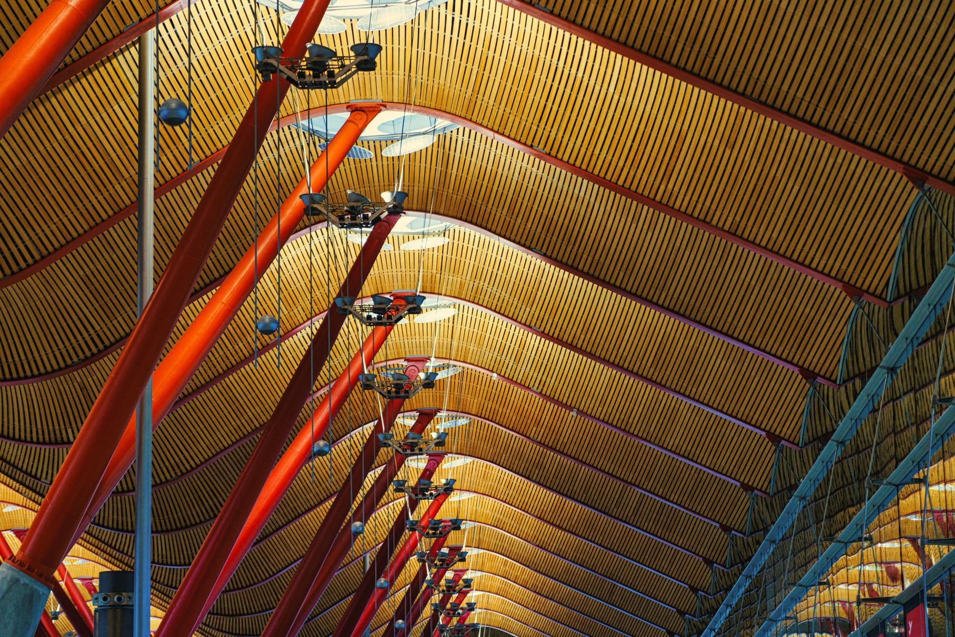 Spacious modern airport terminal with high ceilings and natural light