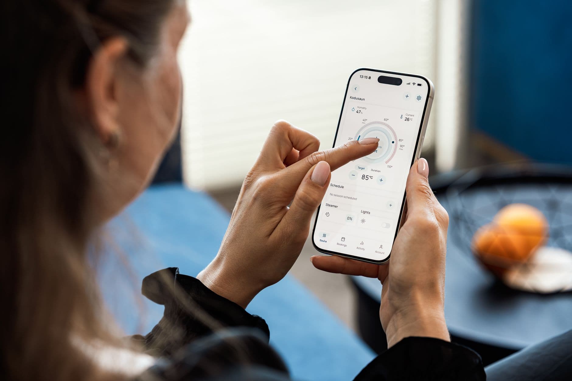 Person searching flight deals on smartphone app for travel booking
